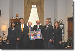 Photo (L to R):  Space Shuttle Discovery Mission Specialist Stephanie Wilson, Mission Specialist Piers Sellers, Pilot Mark Kelly, U.S. Rep. Sherwood Boehlert (NY-24), Mission Specialist Mike Fossum and Mission Specialist Lisa Nowak