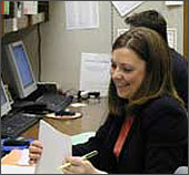 Photo of an intern in Senator Dorgan's office.