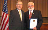 Capitol Hill -- Senator McConnell presents the 2006 Jefferson Award to Dr. Donald Bulter of Bowling Green.  The Jefferson Award is a prestigious national recognition honoring community and public service in America. (June 20, 2006)