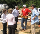 Senator Hagel visits with volunteers at a Habitat For Humanity worksite in North Omaha.
