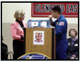 Judy welcomes Space Shuttle Endeavor astronaut and Glenbard East alumnus Dan Tani back to earth from space.
