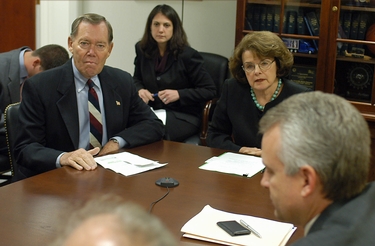 U.S. Sens. Craig Thomas, R-Wyo., and Dianne Feinstein, D-Calif., listen to participants at a meeting September 19, 2006 to discuss ways to get an IGCC power plant up and running in Wyoming. The two senators are building support to seek ways to site an IGCC plant in Wyoming that can deliver cleanly generated electricity to California.