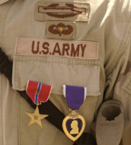 Bronze Star and Purple Heart medals. Linked to full story.