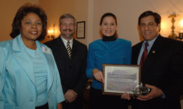 Rothman receives an award from environmental leaders.