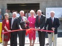 Hoyer cuts the ribbon dedicating the new poultry facility at BARC.