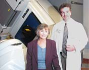 Senator Barbara Boxer and Dr John Stevenson (r), Medical Director, Arnold Palmer Prostate Cancer Center, Lucy Curci Cancer Center pose in front of state-of-the art prostate treatment equipment, during her visit on January 21, 2006.