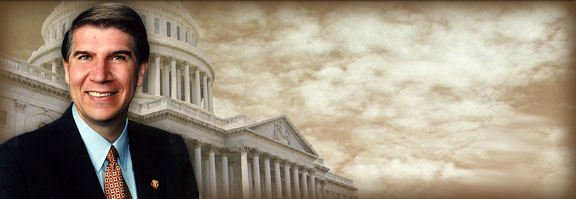 Congressman Ernest J. Istook in front of the U.S. Capitol