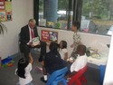 Hoyer reads to children at Laurel Lakes Primary Care. 