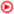This is an image of a red triangle pointing to the right surounded by a circle.