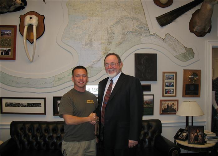 SGT John Naunraq, an Alaskan who recently returned from the Iraq War, visits with Congressman Young