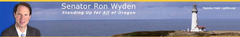 Picture of Senator Wyden, Lighhouse on Oregon Coast in Background
