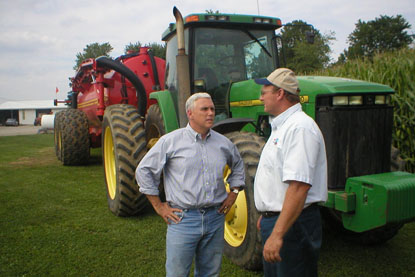 Picture: Rep. Mike Pence discusses farming issues with agricultural producer Mike Dodd in Rep. Pence's district near Columbus, Indiana.