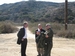 
During a fact-finding trip to the Southwest border to examine border security operations, Senators Norm Coleman (R-MN) and Johnny Isakson (R-GA) visit “Smugglers Gulch” in at the San Diego border. This is a hot-spot for smugglers because of the terrain and the fact that there are high-population areas on both sides of the border. In this picture, they are being briefed by Customs and Border Patrol Officer Michael Hance on plans for the Border Infrastructure System, which is a 14 mile system of roads and fences along the border in the vicinity of San Diego.
