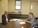 Hoyer discusses the Small Aircraft Transportation System w/ Dr. Norris Krone, President, University Research Foundation.