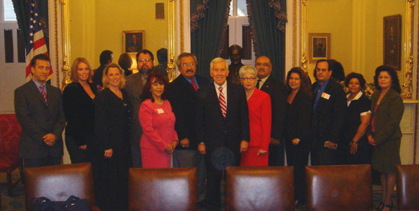 Senator Lugar with Hoosier Hispanic Leadership Summit attendees in the Senate Foreign Relations Committee Room of the U.S. Capitol Building. The 11 Hoosiers were among a total of 44 nominated by Lugar to participate in the Senate Hispanic Leadership Summit on September 27-28 in Washington, DC. From left to right: Homero Del Bosque of Indianapolis, Julie Graves of Indianapolis, Deborah Graves of Indianapolis, Albert Brown-Gort of South Bend, Esther Barber of Indianapolis, Ralph Garcia of Bluffton, Sen. Dick Lugar, Martha Rivas-Ramos of Munster, J. Guadalupe Valiterra of Gary, Lorraine Guillen-Wentz of Gary, Elva Torres of Gary, Irma Herrera of Gary. 