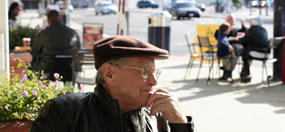 mature man at outdoor cafe