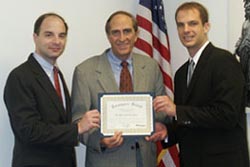 Congressman Hefley receives Taxpayers' Friend Award from National Taxpayers Union President John Berthoud and Paul Gessing, NTU Director of Government Affairs.