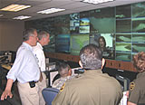 T.V.s displaying pictures of the Rio Grande River in a command center in Laredo are monitored by National Guard troops sent to assist border patrol agents for the security of the border