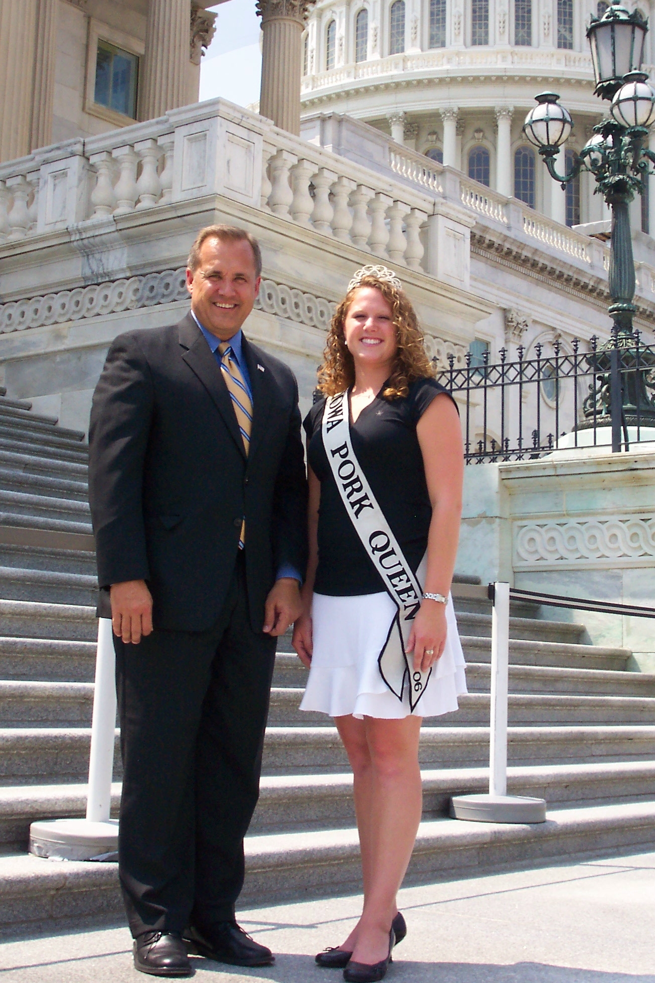 Jim with Iowa Pork Queen, Amber Appleton, on the steps of the United States Capitol.