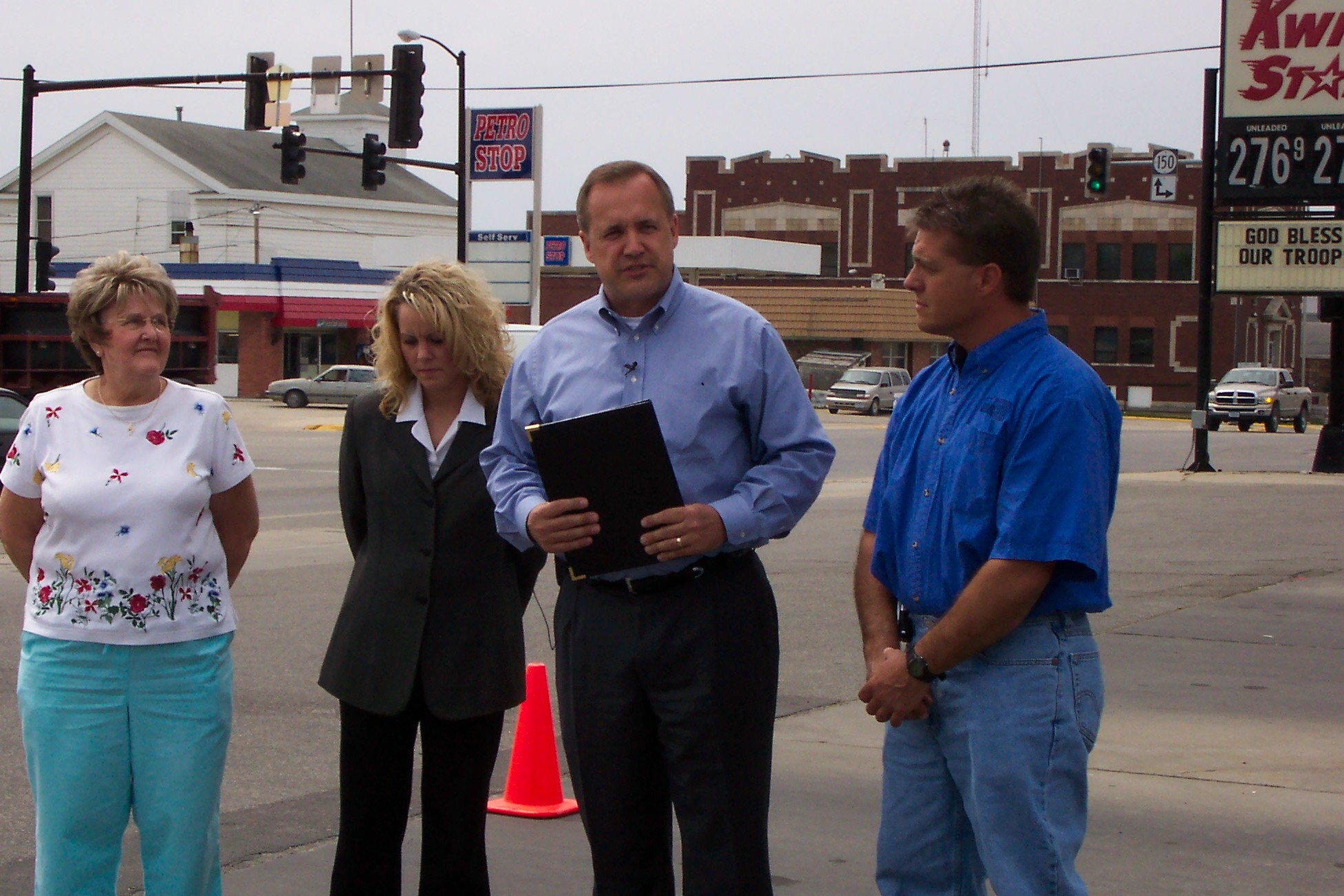 Jim unveils new energy legislation at a gas station in Independence.