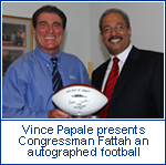 Former Philadelphia Eagle, Vince Papale, whose real life story is the inspiration for the box office hit "Invincible" presents Congressman Fattah an autographed football during a reception hosted by the congressman on Capitol Hill.