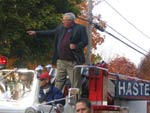 Speaker Hastert rides his fire truck at the annual Sycamore parade.