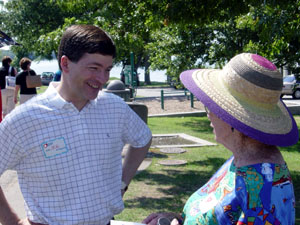 Rep. Hensarling speaks with a constituent regarding tax relief at a community event at White Rock Lake. 