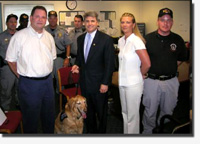 Congressman McCaul meets WMD detention dog Austin at the attend Signature Science's Canine Demonstration