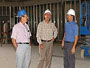 Dr. Ed House, chief ISU researcher, Congressman Mike Simpson, and Darin Dehle, ISU campus architect look over the new ISU L.E. Thelma E. Stephens Performing Arts Center.