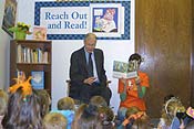 Congressman Skelton reads to children at Truman Medical Centers Oak Grove Family Medical Care Clinic.