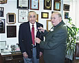 Congressman Ackerman awarding Bayside veteran Sidney Minkoff with the medals he earned but never received for his service during World War II (February 2005)