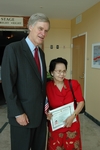 Congressman Ander Crenshaw congratulates a recently naturalized U.S. citizen at a U.S. Citizenship and Immigration Services Naturalization Ceremony  held at FCCJ.