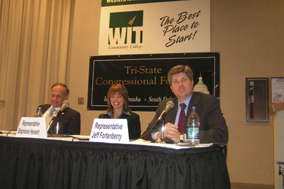 Picture: Reps. Jeff Fortenberry, Stephanie Herseth, and Steve King discuss farm policy issues at the Tri-State Congressional Forum in Sioux City, Iowa, March 13, 2006. 