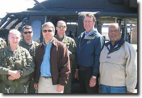 Congressman McCaul, Etheridge and Thompson prepare for a tour with the Louisiana National Guard of New Orleans and Mississippi.