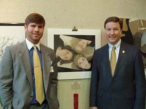Ben Bellew, a senior at Opelika High School, won second place in the annual Third District Congressional Art Contest. Bellew is pictured here with Congressman Rogers and his artwork La Pintura de Bonita.