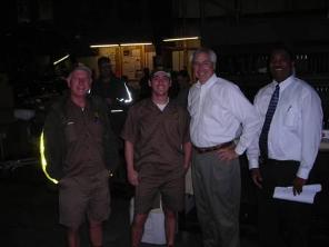 Congressman Barrow visits with UPS drivers and center manager.