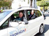 Rep. Tom Petri test driving a General Motors prototype hydrogen car.