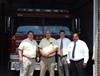 Congressman Chandler  with Judge Exec. R.W. Gilbert, Mayor Billy Dyehouse and Chief Larry Owsley after presenting the Crab Orchard Fire Department with an $18,000 check on August 14, 2008