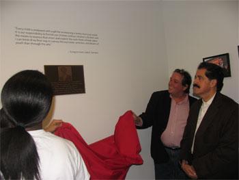 Image: Serrano speaking at the Bronx Museum of the Arts event with Douglas Rice, Chairman of the Board of the Museum, behind him
