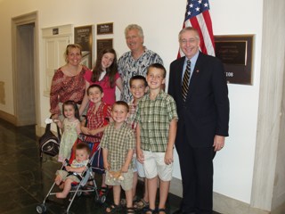 thumbnail image: Congressman Davis pictured with the McDowell Family