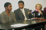 Congressman Kendrick B. Meek and Cheryl Little of the Florida Immigrant Advocacy Center at a press conference on Monday, March 28, 2005 with Ernso Joseph.