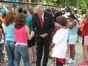 Hoyer greets kids at YMCA Camp Letts.