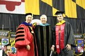 Hoyer &  UMD President C.D. Mote, Jr. take a picture with student who introduced Rep. Hoyer.