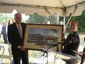 Rep. Hoyer receives a framed picture of the new building.