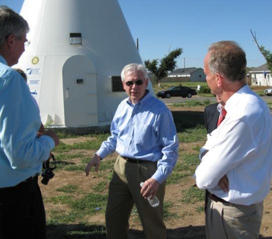 Rural Development Under Secretary Thomas C. Dorr and U.S. Congressman Jerry Moran join Greensburg, Kan., Mayor Bob Dixson (left) at a water tower project RD is helping finance.