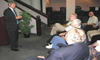 Congressman McCaul discusses taxes at an event in Brenham.