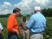 Rogers visits a farm in his visit during his Annual Agricultural Tour of the Third Congressional District.