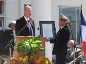 July 7, 2007 - Congressman Ike Skelton presents Major General Delon with a framed copy of House Resolution 171, legislation authored by Skelton and passed by the House to honor Marquis de Lafayette.