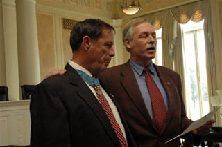 U.S. Representative Vic Snyder presented the Purple Heart Medal to Mr. Nick Bacon, a Vietnam War Medal of Honor recipient on Saturday February 2, 2008 (Photo by Dub Allen).