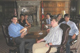 Seated are interns in the Little Rock District office of Congressman Snyder.